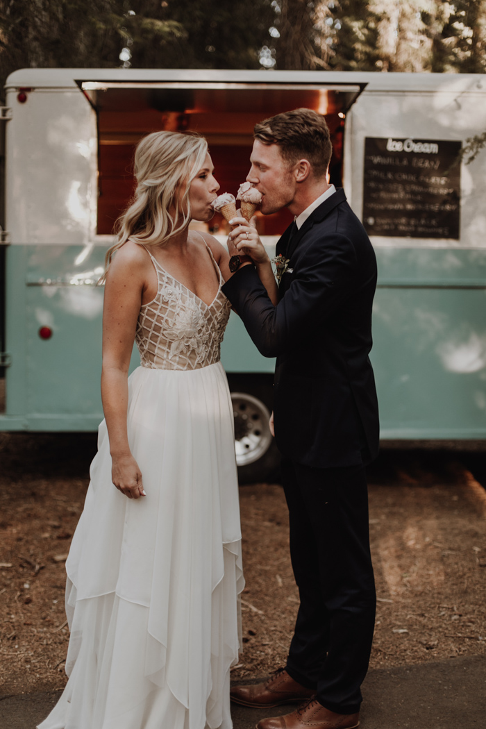 Bride and Groom feeding each other ice cream cones